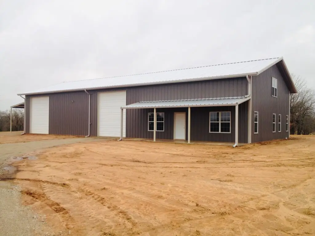 dark gray and white barndominium