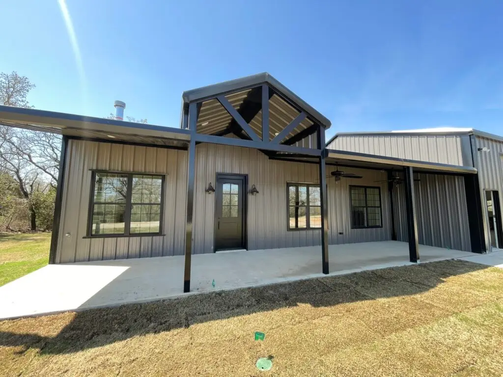 tan and dark brown barndominium